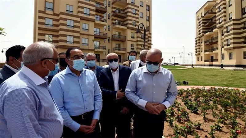 بالصور | مدبولي يتفقد وحدات الإسكان بحدائق أكتوبر