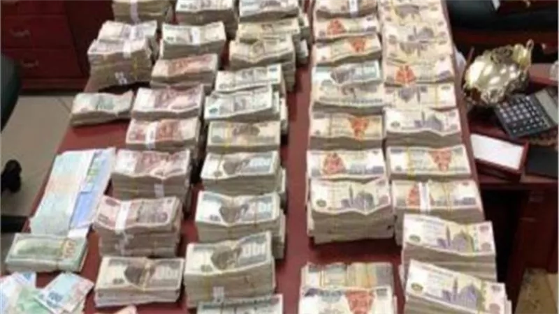 تاجر عملة يغسل 16 مليون جنيه في شراء أراض وسيارات